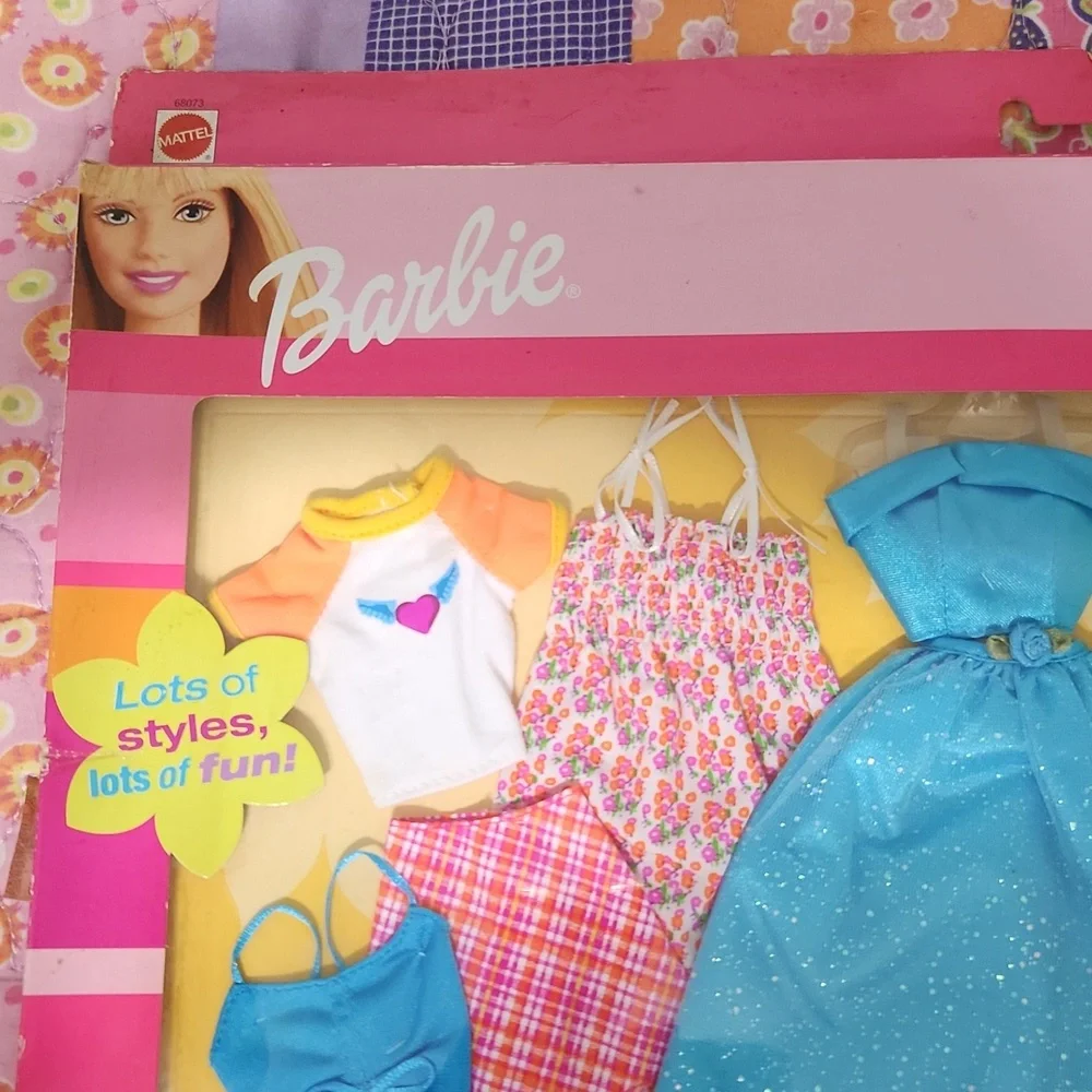 Brand New never opened Barbie fashions.